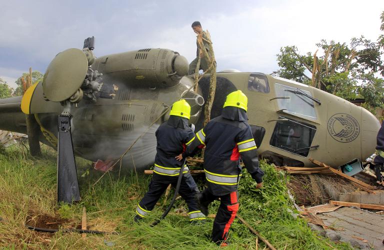Hiện trường máy bay quân sự Philippine Air 103 bị rơi Kampo Ranao Marawi, miền nam Philippines, một vài phút sau khi cất cánh.