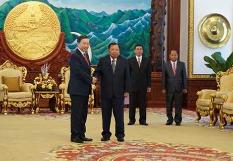 Bộ trưởng Tô Lâm và Tổng Bí thư, Chủ tịch nước CHDCND Lào Bun-nhăng Vo-la-chít.