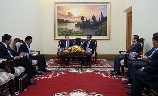 Bộ trưởng Tô Lâm và Phó Thủ tướng kiêm Bộ trưởng Bộ Nội Vụ Vương quốc Campuchia  Sar Kheng.