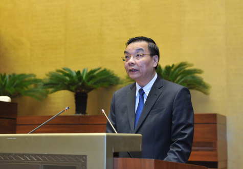 Bộ trưởng Bộ Khoa học và Công nghệ Chu Ngọc Anh, thừa ủy quyền của Thủ tướng Chính phủ trình bày Tờ trình về dự án Luật Chuyển giao công nghệ (sửa đổi). Ảnh: VGP/Nhật Bắc