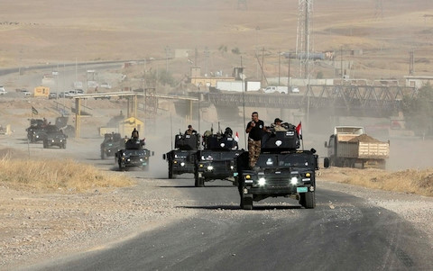 Binh sĩ đặc nhiệm Iraq tiến quân về Mosul. Ảnh: Reuters