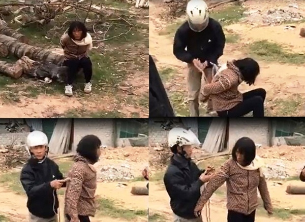 Hình ảnh người phụ nữ bị bắt, trói nhầm tại Diễn Châu vì nghi bắt cóc trẻ em (Ảnh cắt từ video clip)