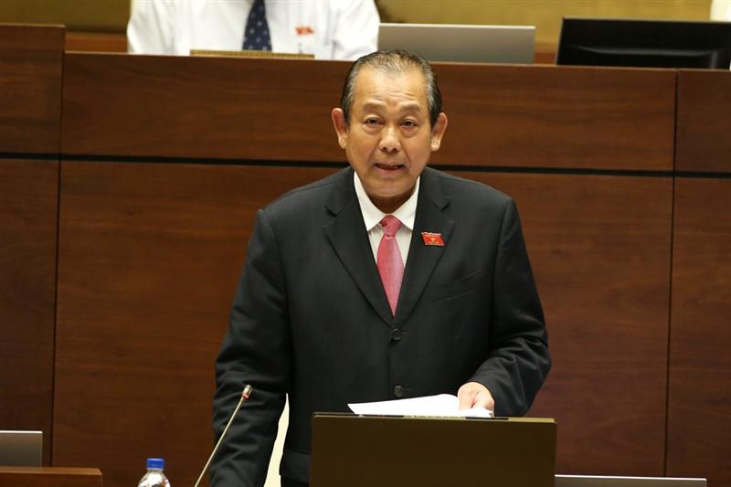 Phó Thủ tướng Thường trực Chính phủ Trương Hòa Bình trả lời chất vấn của các ĐBQH. Ảnh: VGP/Nhật Bắc