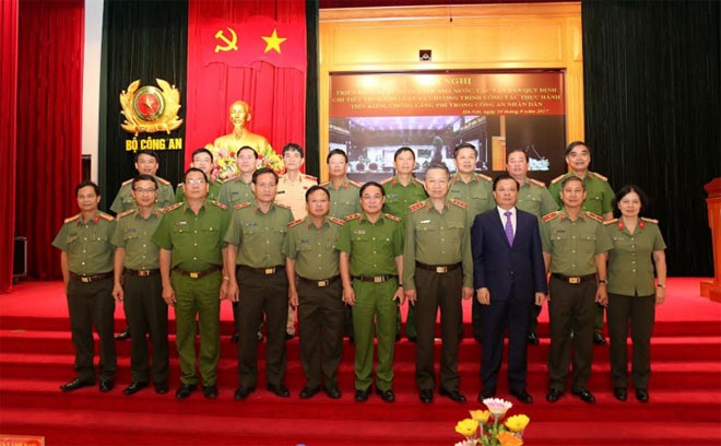Bộ trưởng Tô Lâm, Bộ trưởng Đinh Tiến Dũng và các đại biểu tham dự hội nghị.