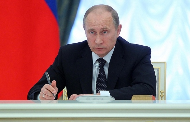 Tổng thống Nga Vladimir Putin ngày 16-10 đã ký một sắc lệnh về các biện pháp thực hiện Nghị quyết trừng phạt của Hội đồng Bảo an Liên Hợp Quốc đối với CHDCND Triều Tiên. Ảnh: TASS