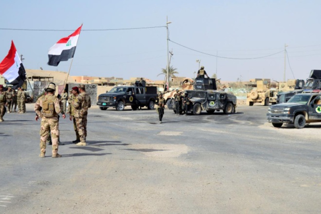 Lực lượng vũ trang Iraq tại thị trấn Rawa - khu vực cuối cùng từng bị IS chiếm đóng ngày 17-11. Ảnh: Reuters