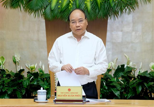 Thủ tướng phát biểu tại phiên họp Chính phủ thường kỳ tháng 5/2018. Ảnh: VGP/Quang Hiếu