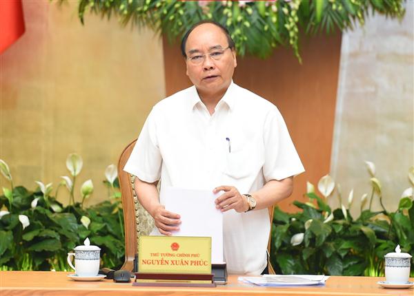 Thủ tướng Nguyễn Xuân Phúc phát biểu kết luận phiên họp Chính phủ thường kỳ tháng 7. Ảnh: VGP/Quang Hiếu