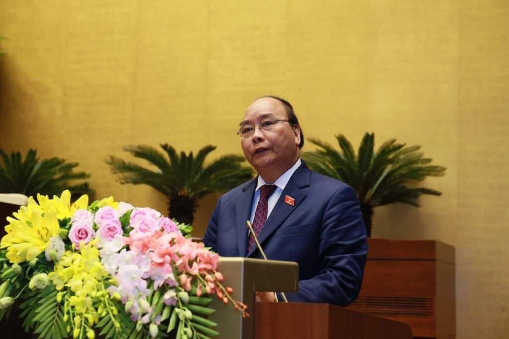 Thủ tướng Nguyễn Xuân Phúc trình bày Báo cáo tình hình KTXH năm 2018 và kế hoạch phát triển năm 2019 - Ảnh: VGP/Nhật Bắc