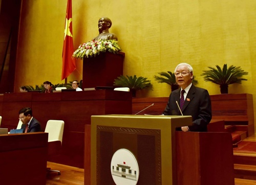 Tổng Bí thư, Chủ tịch nước Nguyễn Phú Trọng trình bày Tờ trình về việc đề nghị Quốc hội phê chuẩn Hiệp định CPTPP. Ảnh: VGP/Nhật Bắc