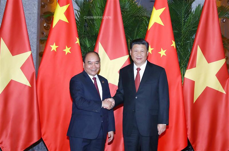 Thủ tướng Nguyễn Xuân Phúc và Tổng Bí thư, Chủ tịch Trung Quốc Tập Cận Bình. Ảnh: VGP/Quang Hiếu