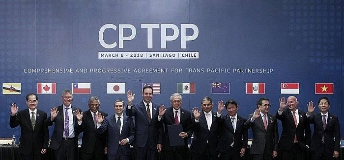 Đại diện các nước tham gia lễ ký Hiệp định CPTPP ở Santiago, Chile ngày 8/3. (Ảnh: THX/TTXVN)