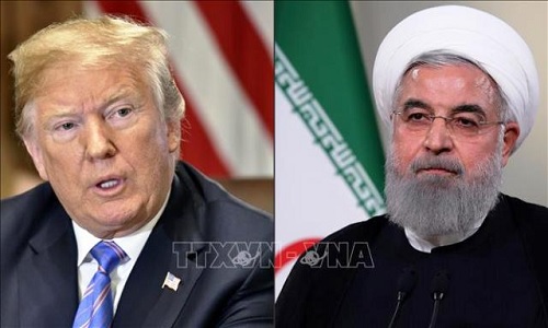 Tổng thống Mỹ Donald Trump (trái) và Tổng thống Iran Hassan Rouhani (Ảnh: AFP/TTXVN)