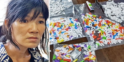 Nguyễn Thị Thảo Nhiên và hơn 1.200 tép heroin. Ảnh : CATP Nha Trang.