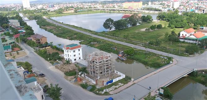 Nhiều khu biệt thự thuộc dự án của Công ty Danatod lấn chiếm, vi phạm hành lang đê điều công trình sông Vinh