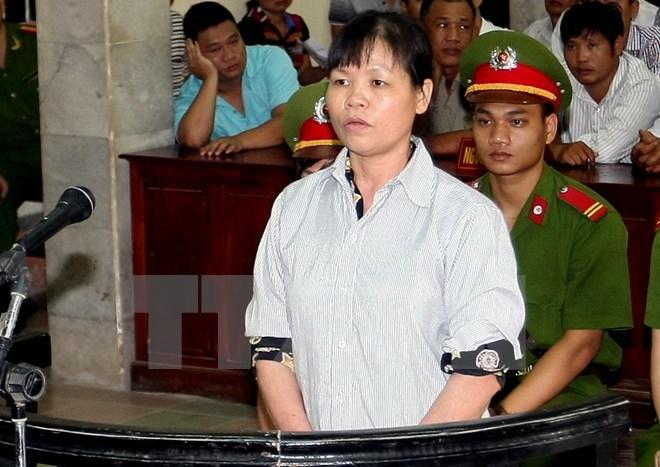 Cấn Thị Thêu tại phiên toà xét xử năm 2014.