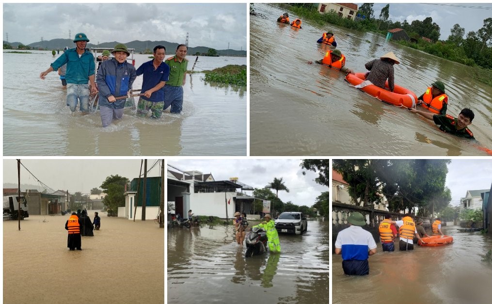 Cán bộ, chiến sĩ Công an huyện Quỳnh Lưu giúp đỡ người dân và phương tiện di chuyển qua các tuyến đường bị ngập sâu