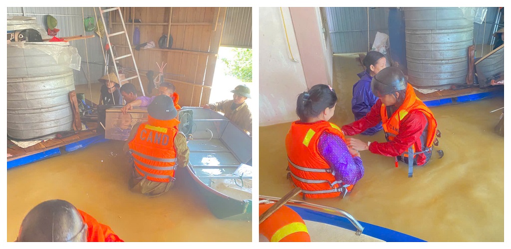 Công an xã Tam Đồng hỗ trợ người dân di dời thùng đựng lúa và các vật dụng, đồ dùng lên nơi cao, an toàn