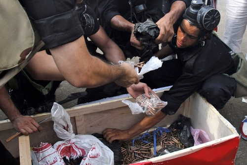 Security forces uncovered a box full of ammunition which they claim to have found during the clearing of one of the two sit-in sites.