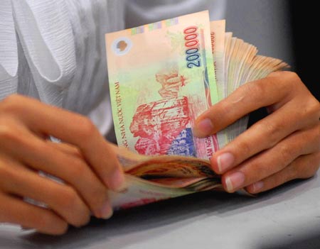 Tăng mức lương tối thiểu vùng từ 1/1/2014