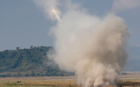 Hệ thống HIMARS của Mỹ khai hỏa. (Ảnh: Reuters)