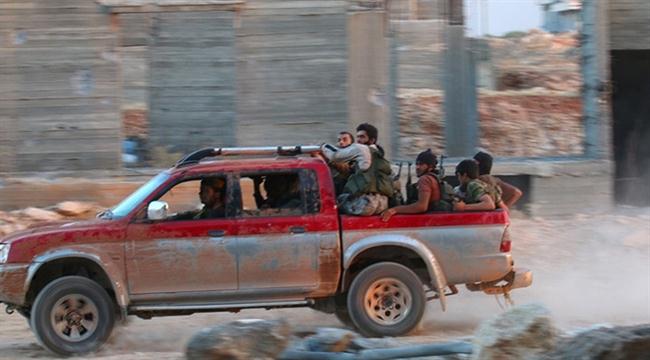 Các tay súng thuộc Hayat Tahrir ash-Sham được trang bị tối tân. Ảnh: RT