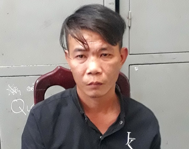 Hung thủ Bùi Quang Hoàng sau khi bị tạm giữ hình sự.