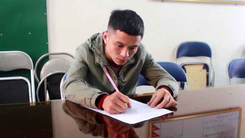 Đặng Bá Thảo tại cơ quan công an