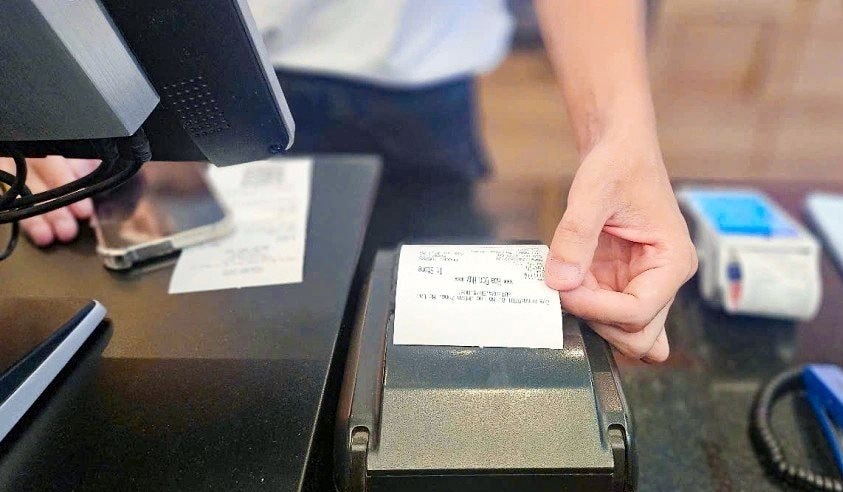 Các đại lý tạp hóa đã thực hiện việc xuất hóa đơn khởi tạo từ máy tính tiền( Ảnh  minh hoạ
